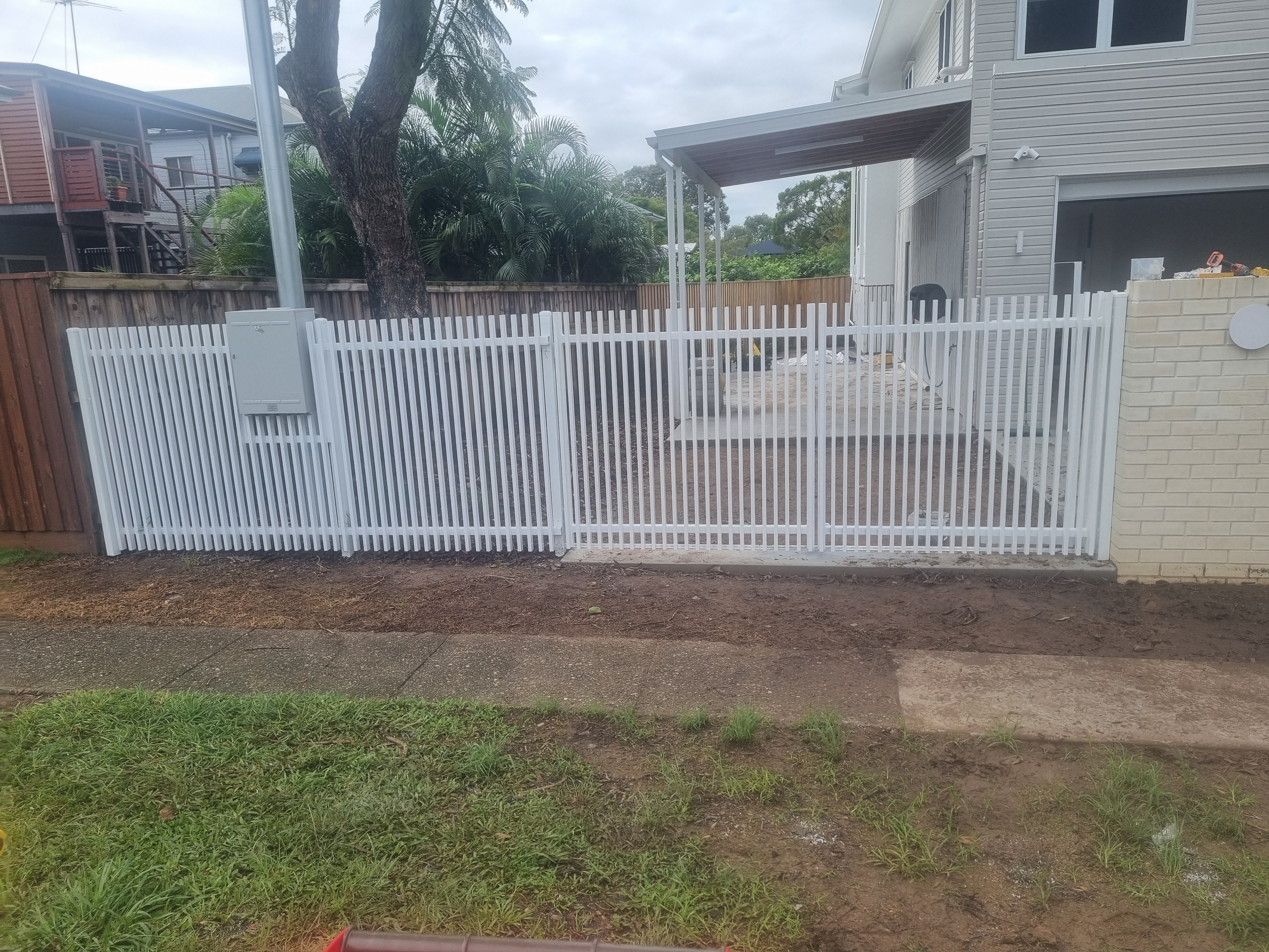 Black tubular sliding driveway gate at an Elimbah entry - Gateflex, Elimbah