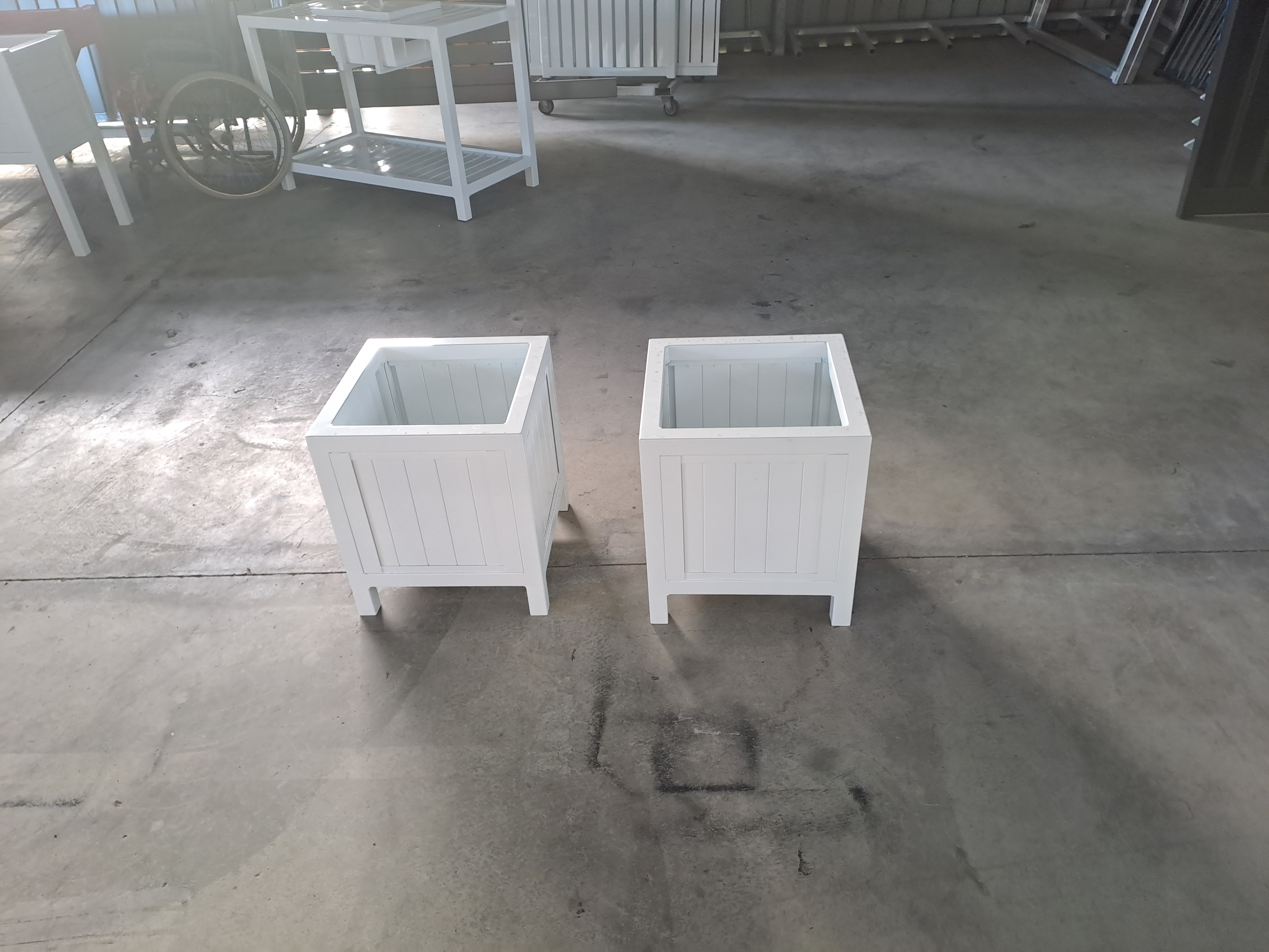 White custom-built aluminium planter boxes ready for installation - Gateflex, Caboolture