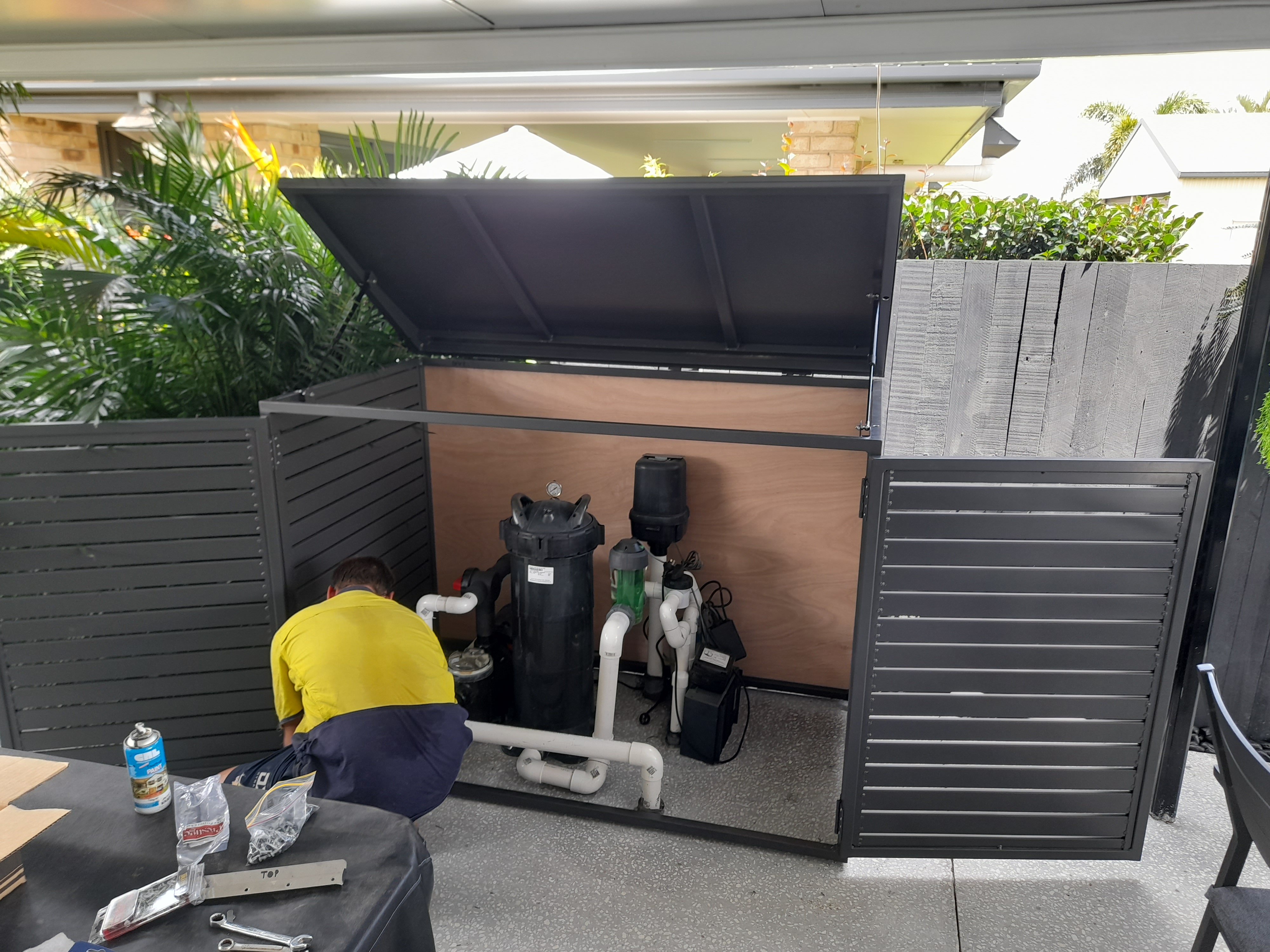 Black aluminium screen enclosing equipment at an Elimbah site - Gateflex, Elimbah