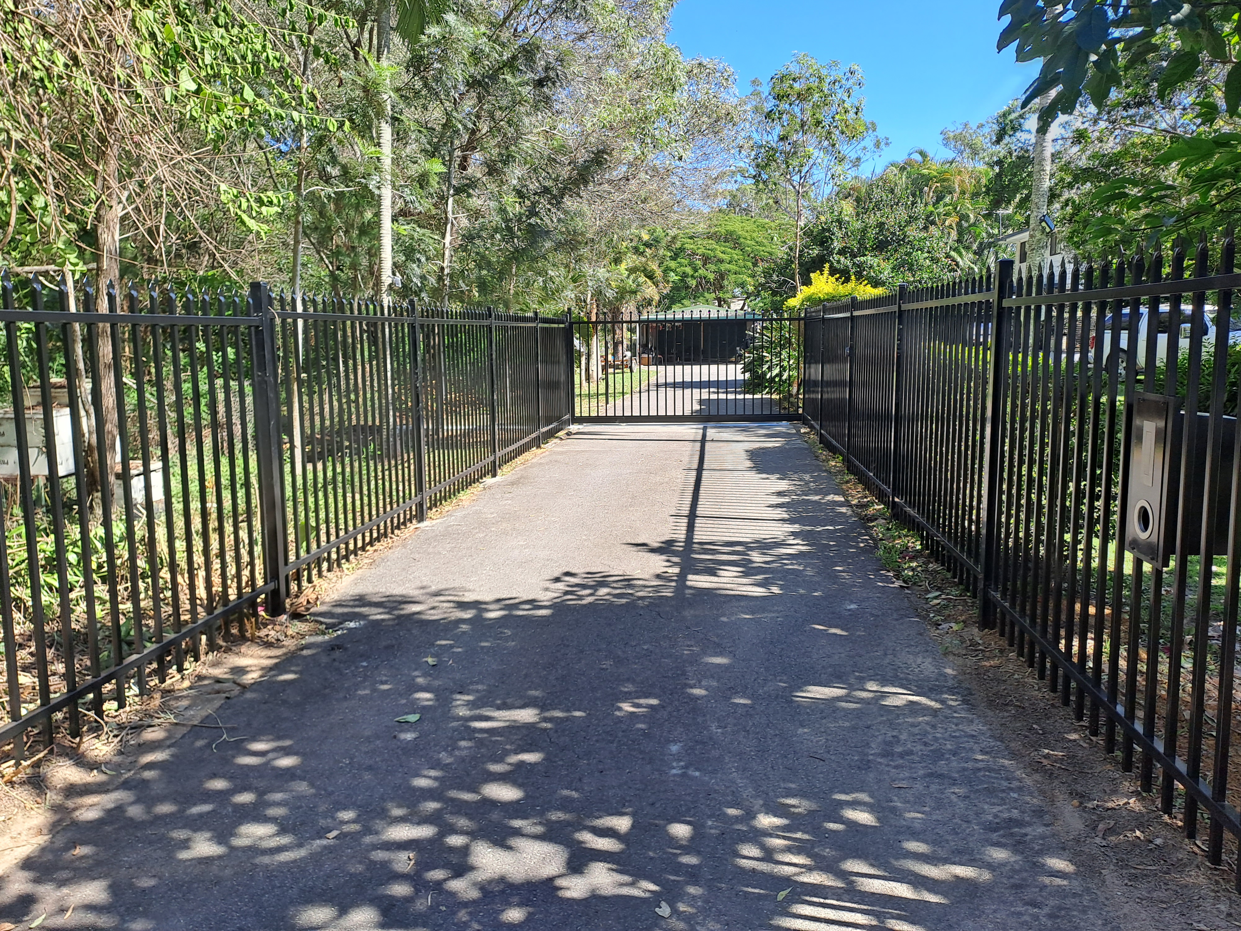Glass and tubular aluminium pool fencing installed at a Redcliffe home - Gateflex, Redcliffe