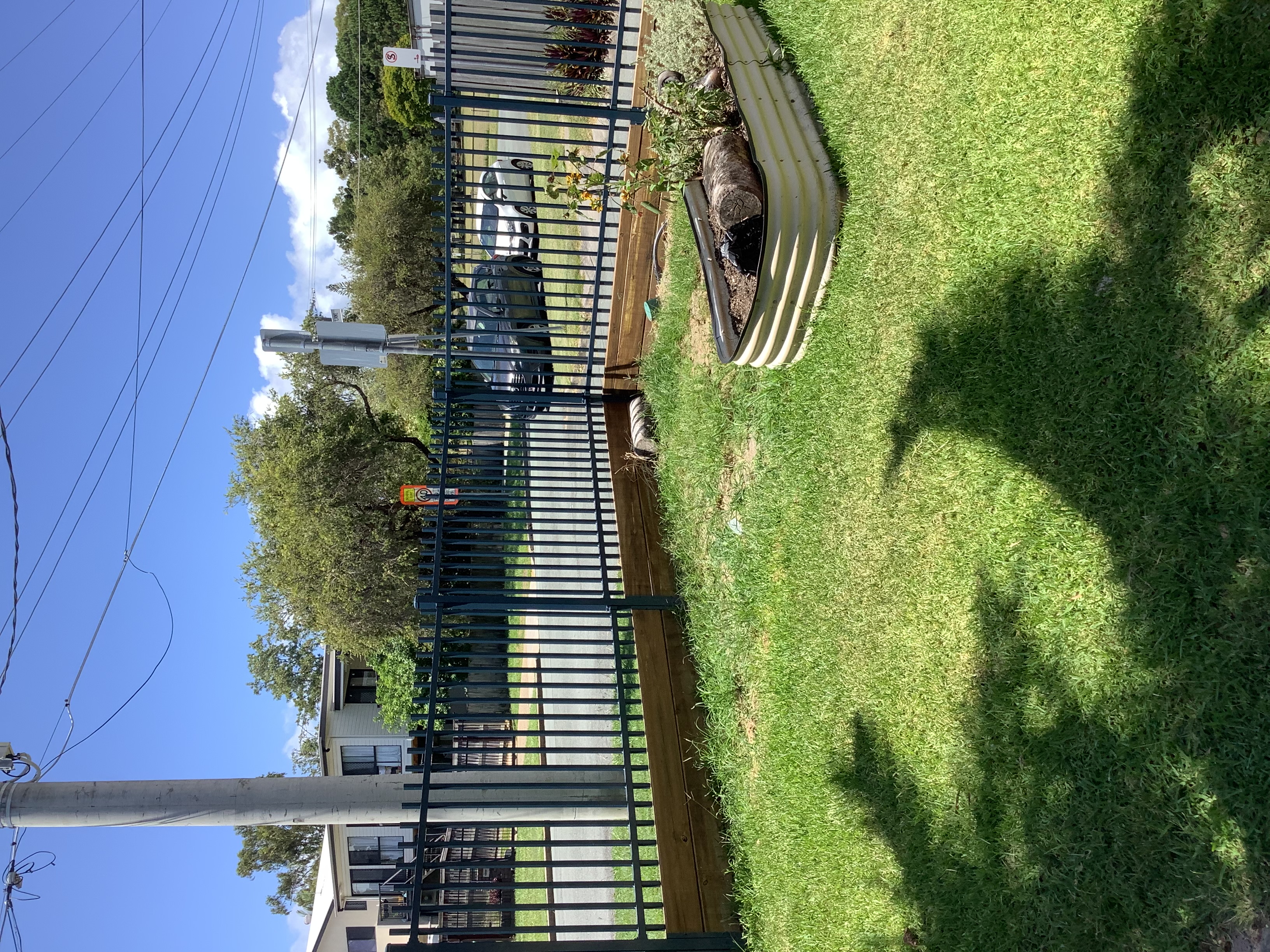 Black horizontal slat aluminium fence at a North Lakes home - Gateflex, North Lakes